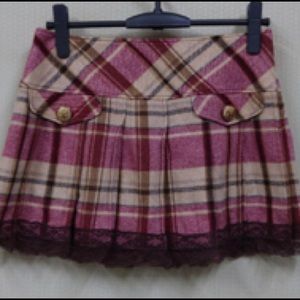 Liz lisa skirt! i don’t know the exact size but i would say a small!